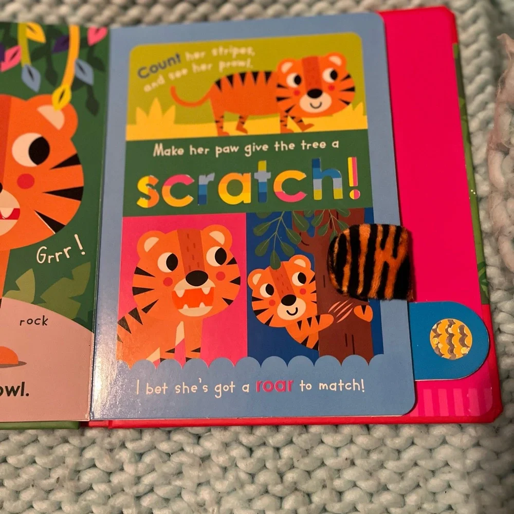 Scholastic Colorful Animal Sensory Board Book